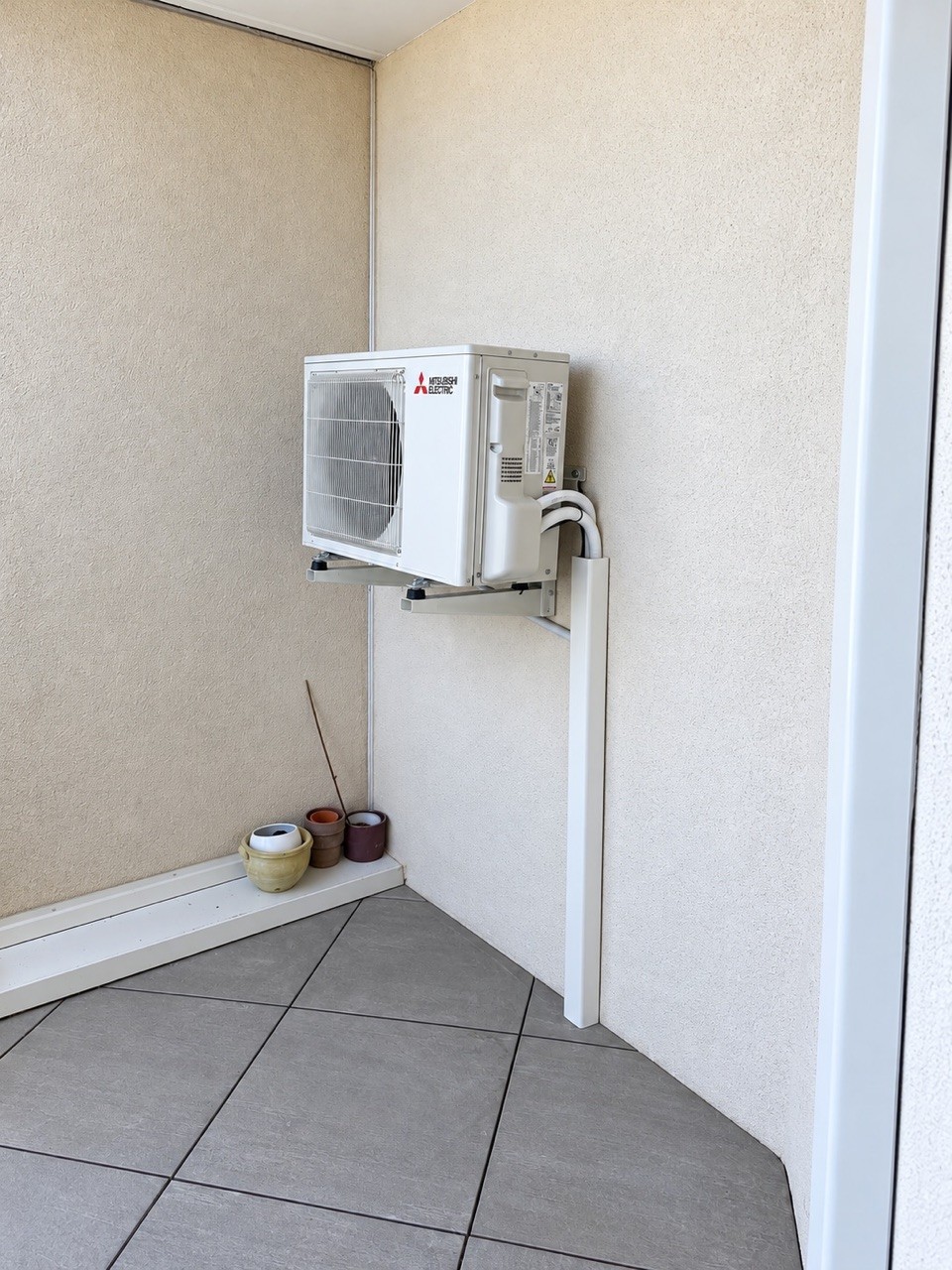 Groupe extérieur · Dans une loggia